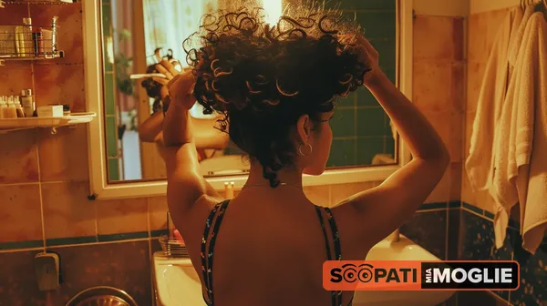 Amore è..._Dani che si prepara allo specchio, si sistema i suoi fantastici capelli ricci neri. Nel mentre io la guardo da dietro, contento che vada a scopare un altro, perchè sono un cuckold.